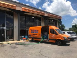 sewage cleanup van at business